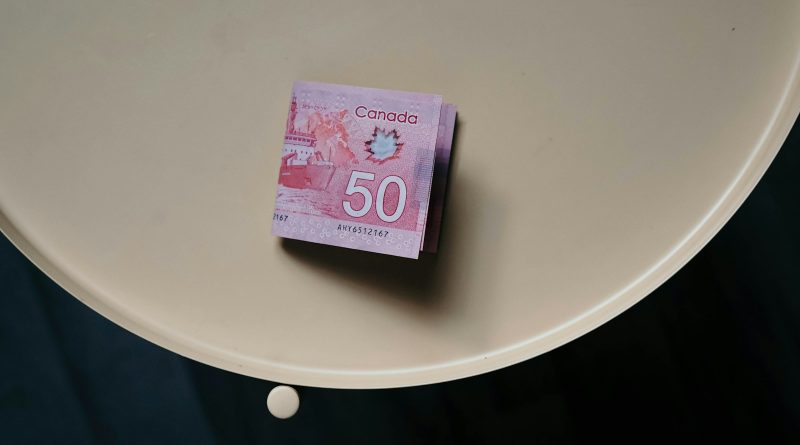 a 50 euros bill sitting on top of a toilet